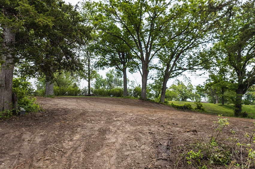 Cleared and graded land after a completed house demolition in Iowa.